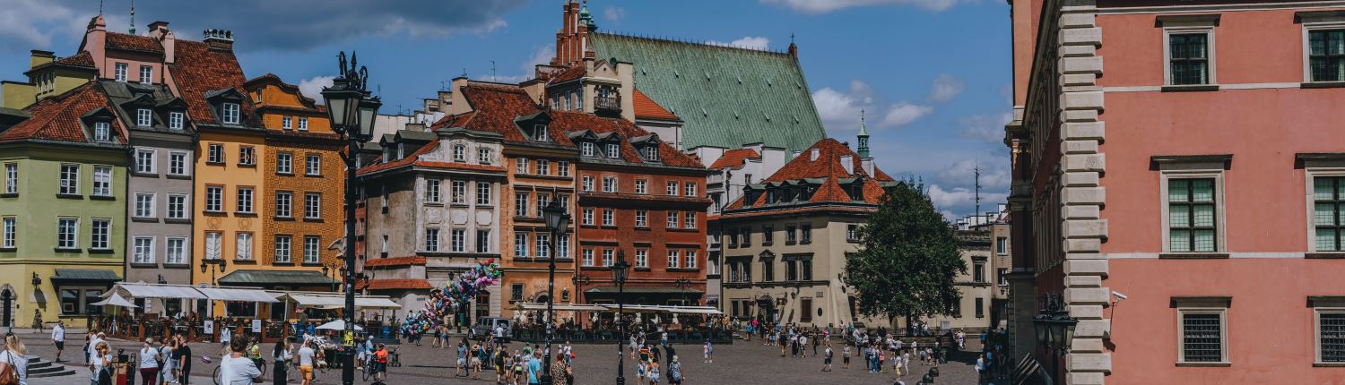 Historic buildings beside a public square in Warsaw, Poland